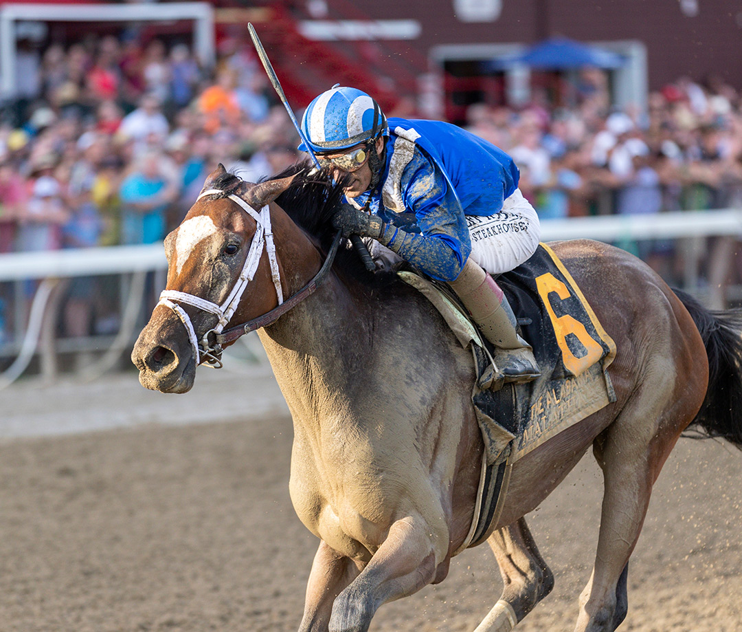 Malathaat wins the 2021 Alabama Stakes at Saratoga Race Course