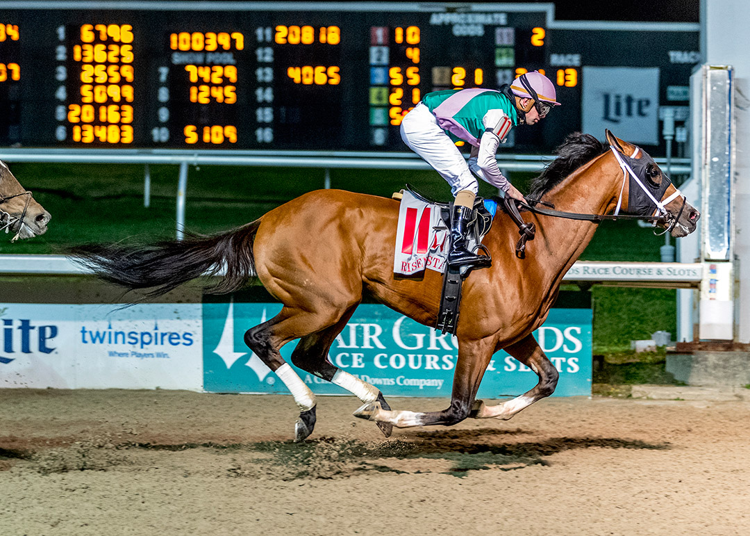Mandaloun wins the 2021 Risen Star Stakes at Fair Grounds