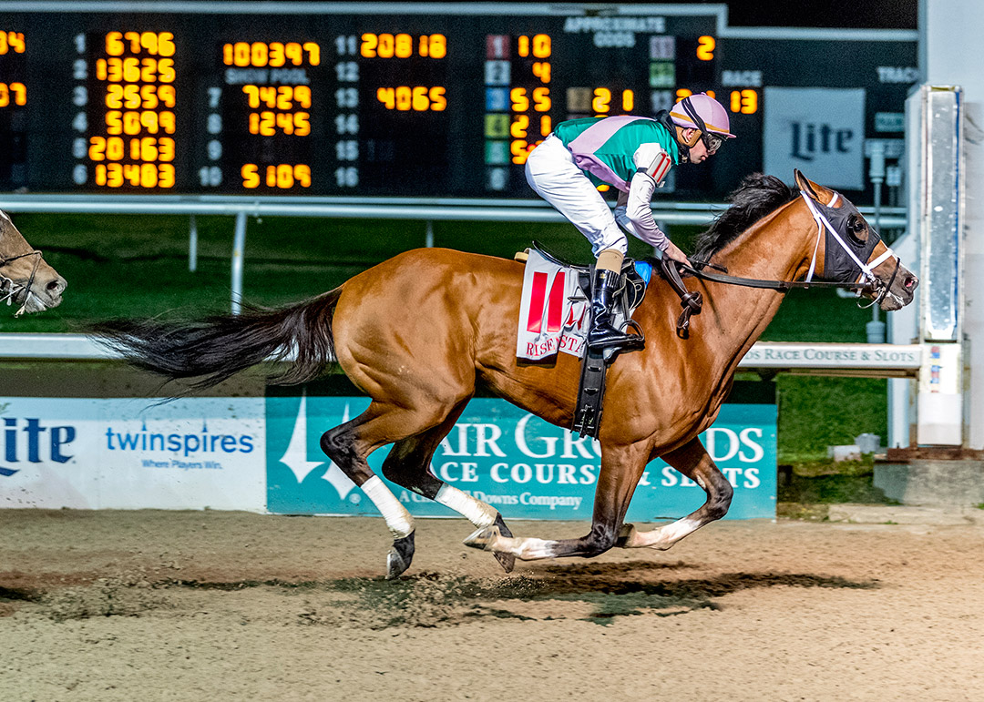 Mandaloun wins the 2021 Risen Star Stakes at Fair Grounds