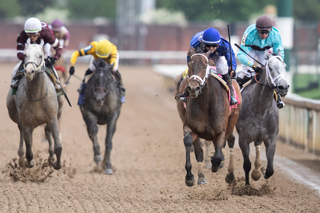 Matareya (second from right) wins the Eight Belles Stakes at Churchill Downs