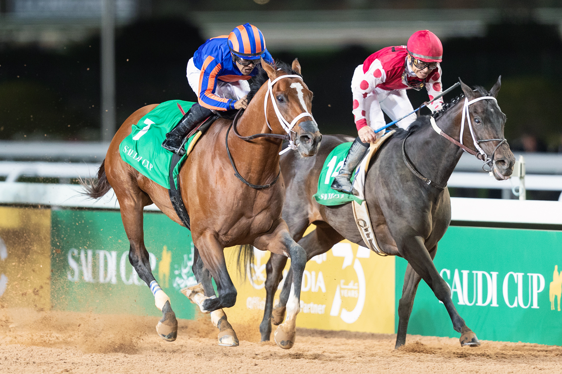 Maximum Security (left) beats Midnight Bisou in the inaugural Saudi Cup