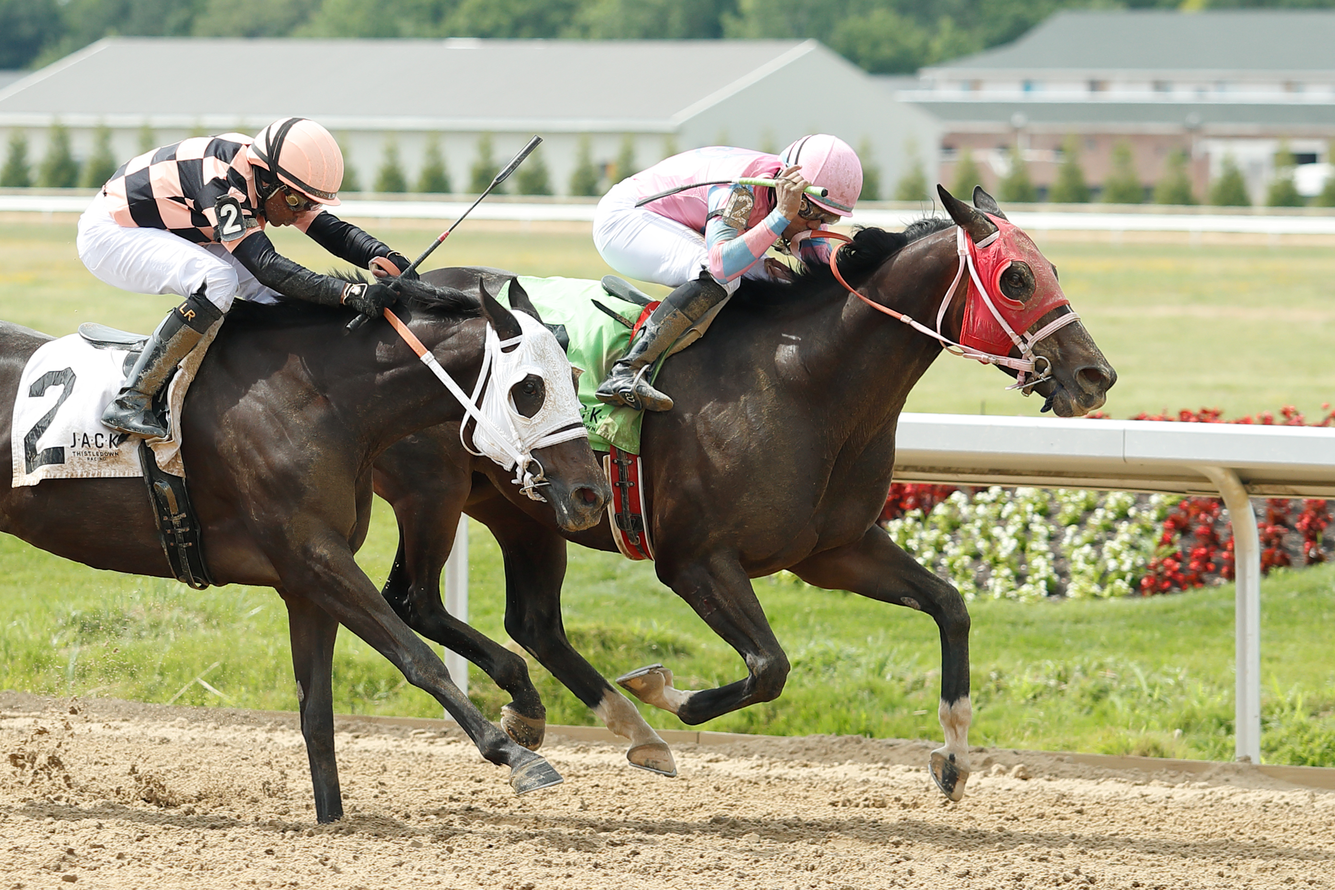 Mobil Solution (right) holds off Relish the Ride in the George Lewis Memorial on June 25 2022