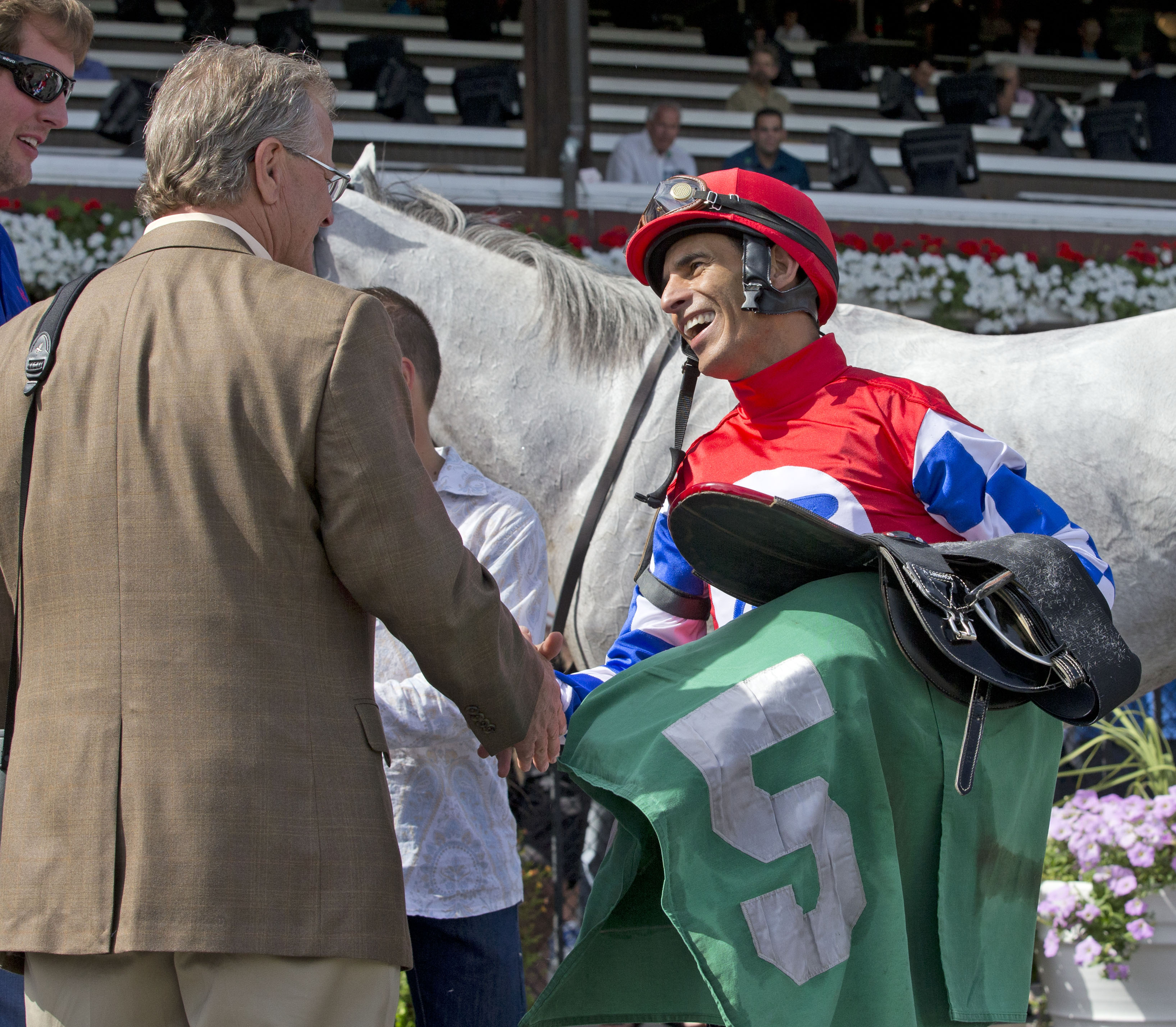 Bill Mott congratulates John Velazquez at Saratoga