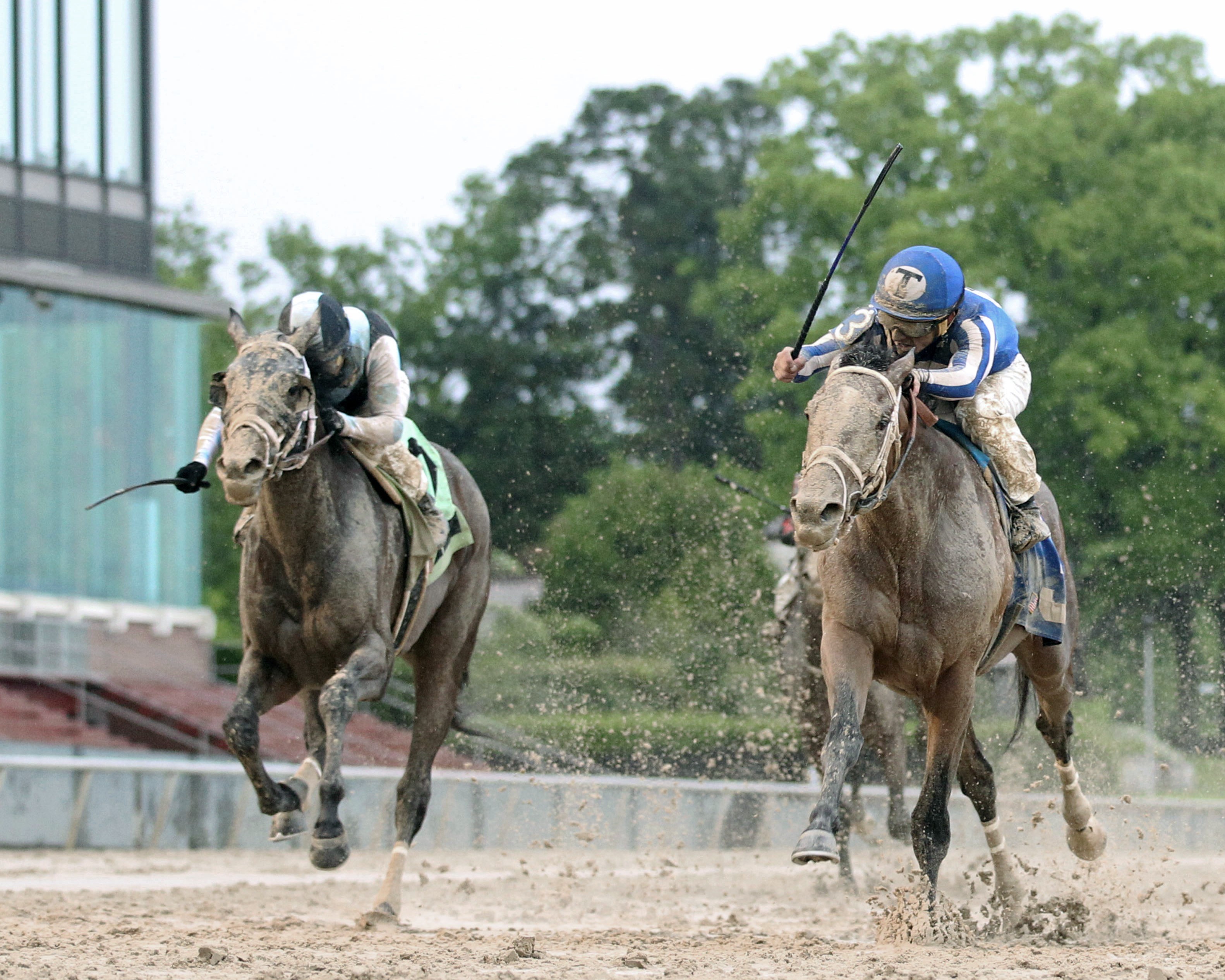 Mr. Big News holds off Farmington Road to win the Oaklawn Stakes 4-11-2020.CO