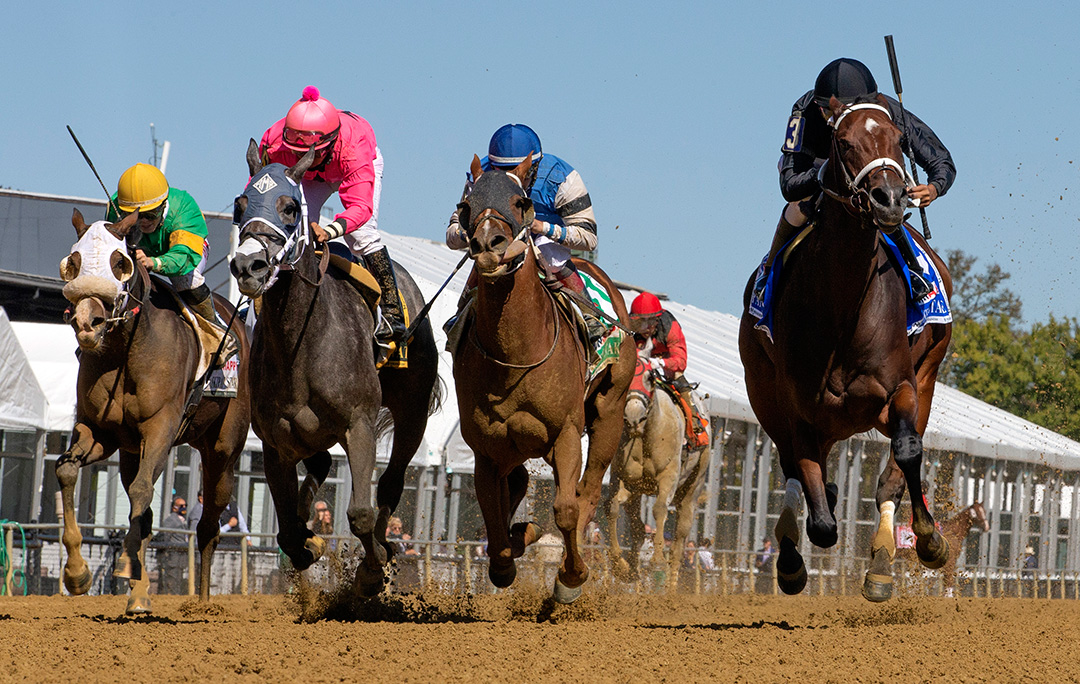 Never Enough Time (far right) wins the 2020 Skipat Stakes at Pimlico Race Course