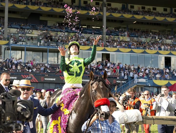Flavien Prat celebrates after winning the Queen's Plate