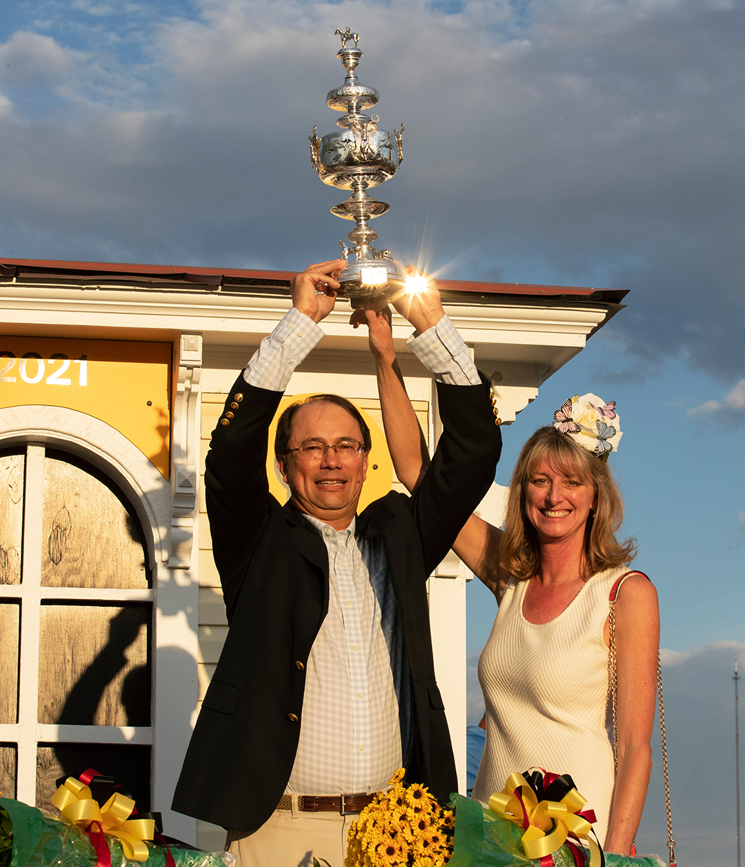 Owners John and Diane Fradkin with the Preakness trophy at Pimlico Race Course