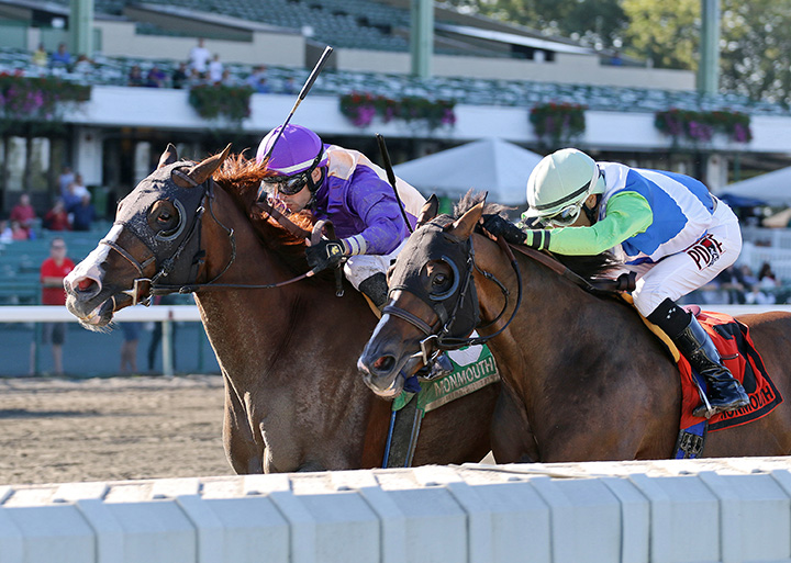 Phat Man (left) wins the Good Magic Mile at Monmouth Park