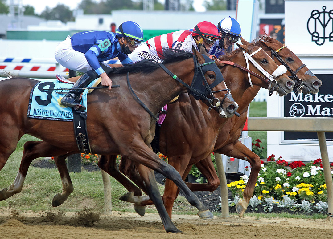 Red Ghost (inside) wins the 2021 Miss Preakness Stakes at Pimlico Race Course