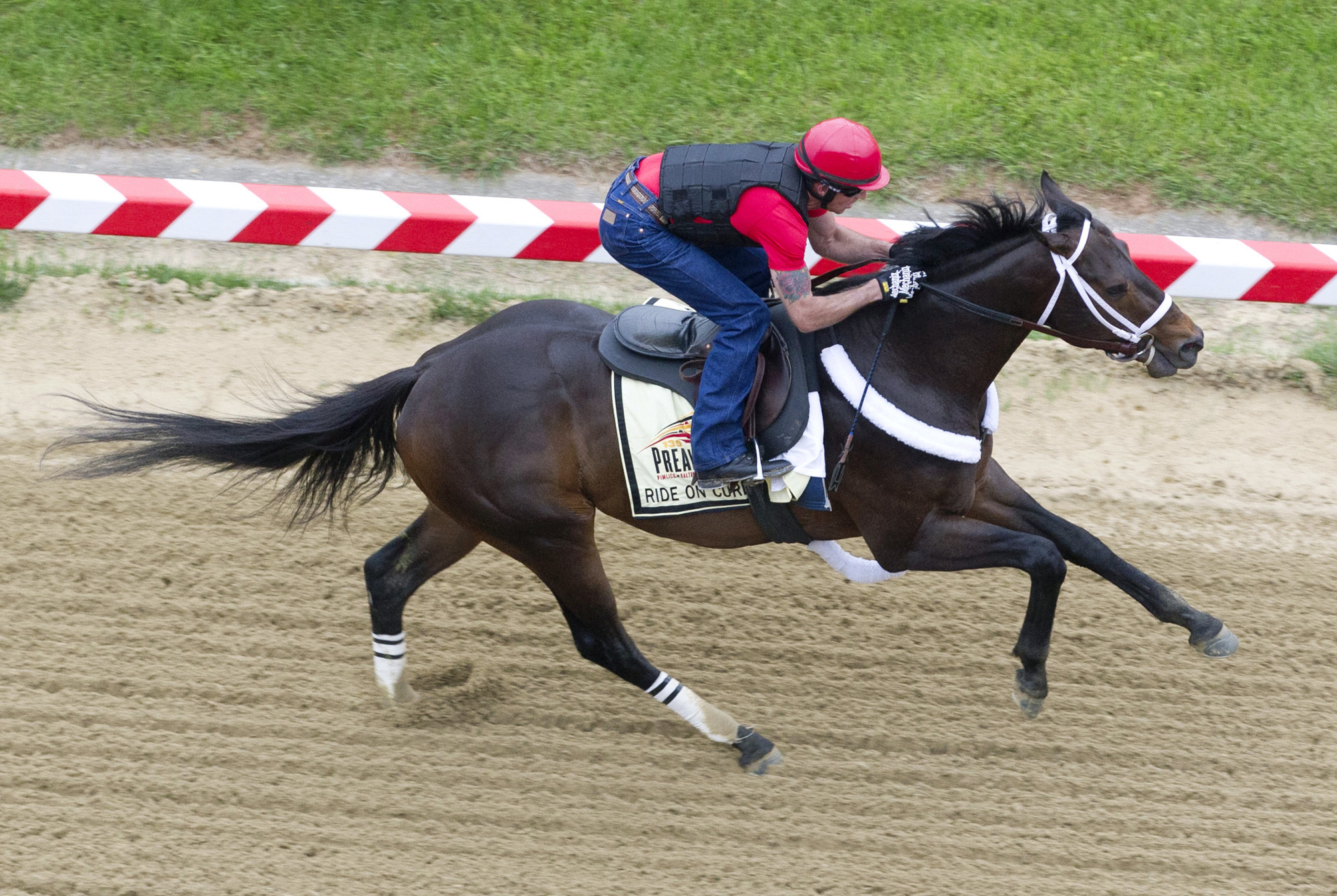 Ride On Curlin trains on May 14