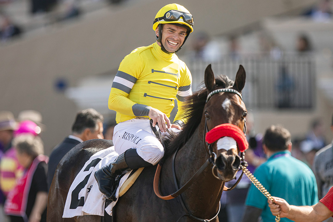 Umberto Rispoli aboard A G Indy after winning the Sen. Ken Maddy Stakes at Del Mar