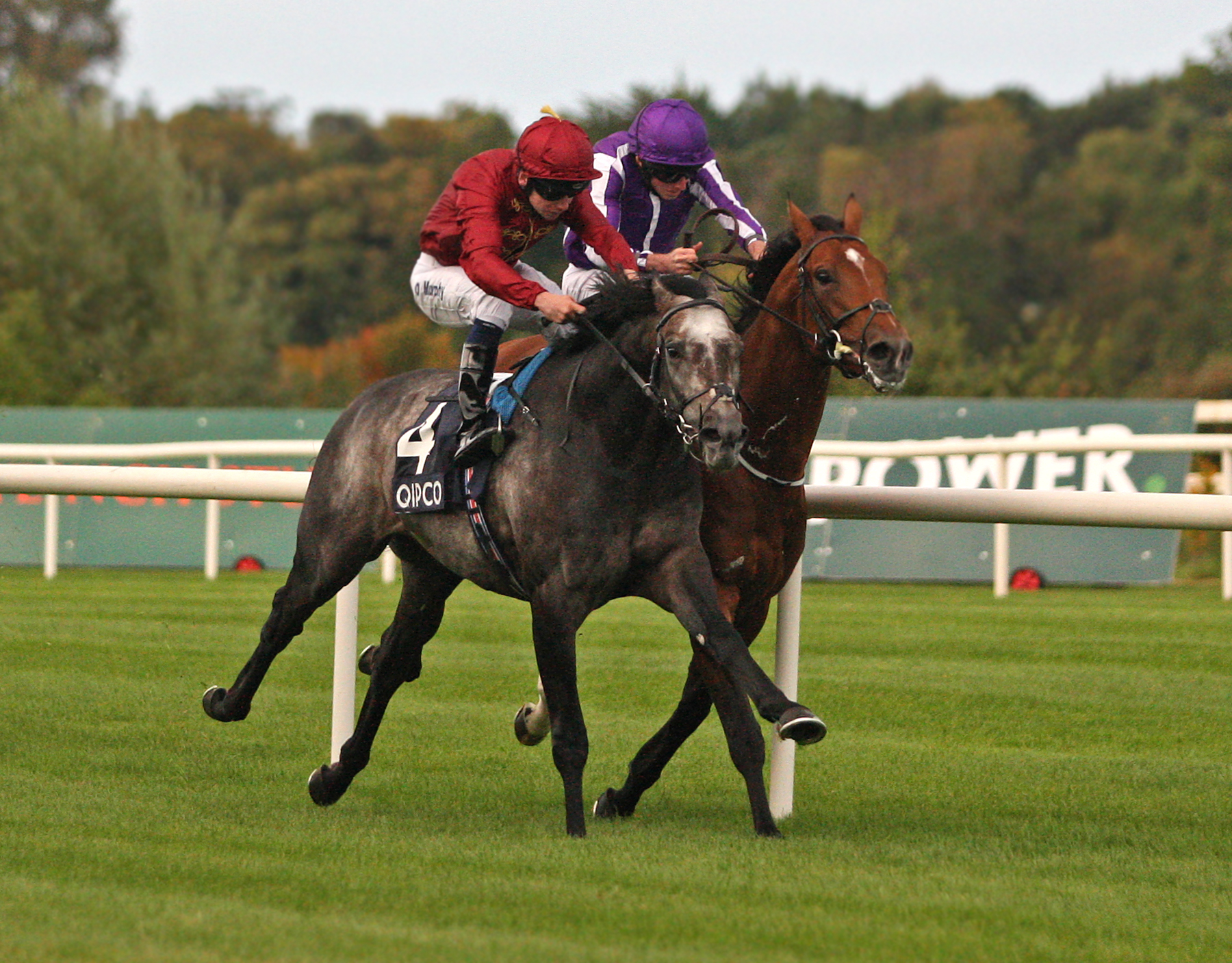 Roaring Lion (left) wins the 2018 Irish Champion Stakes