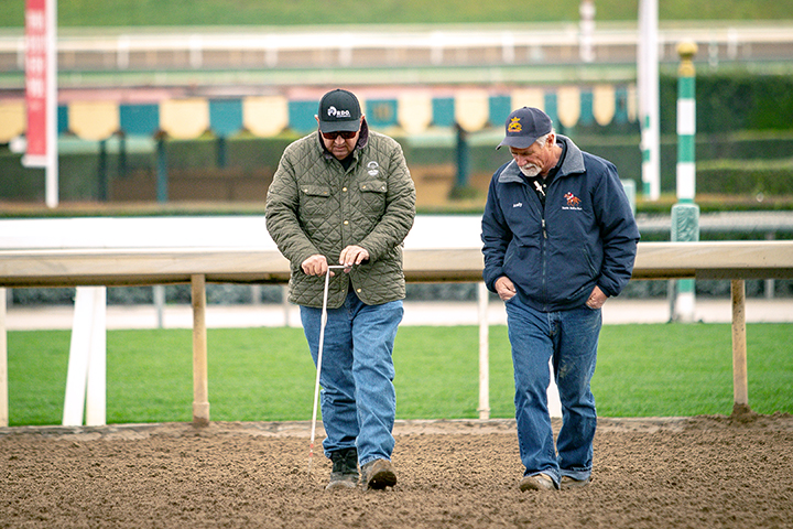 Dennis Moore (left) at Santa Anita Park in March