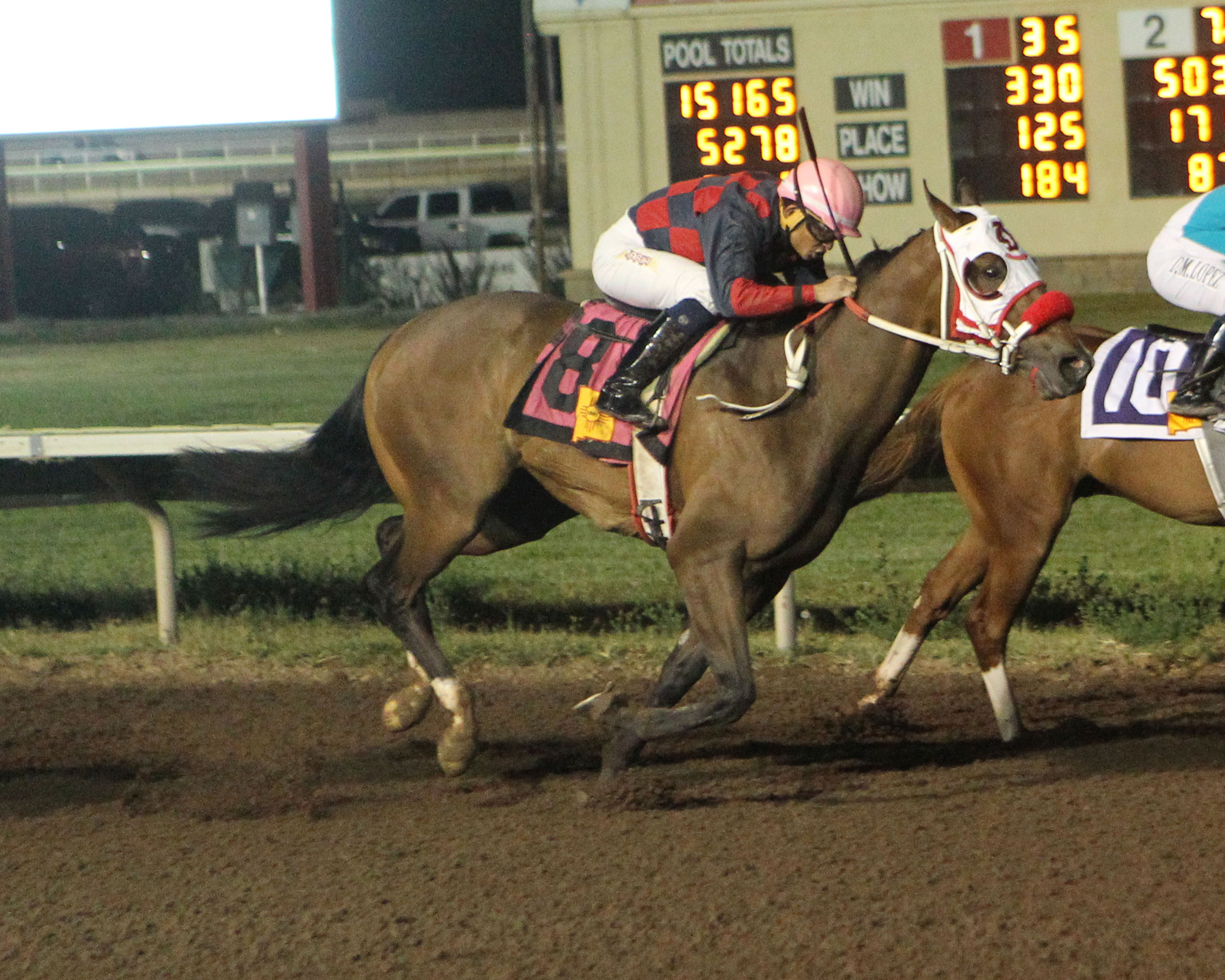 Storm the Beach (#8) got up to tag One Key at the wire in Saturday's Manzano Stakes at The Downs at Albuquerque.