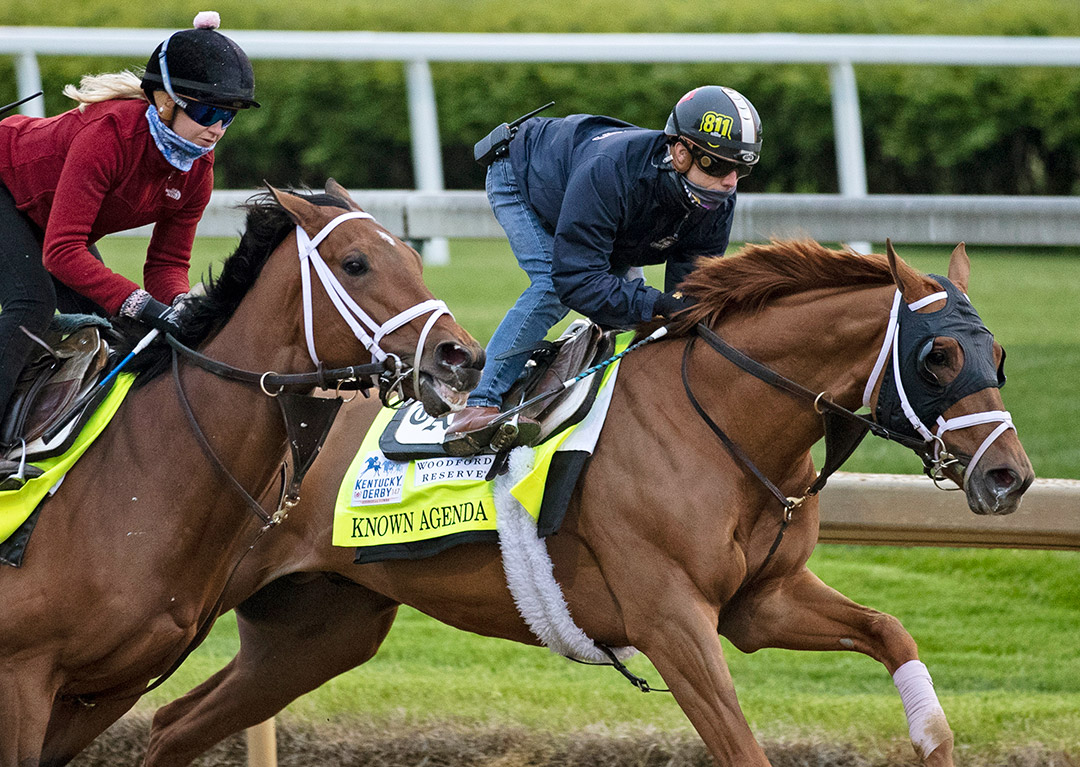 Sainthood (outside) and Known Agenda train at Churchill Downs on April 23