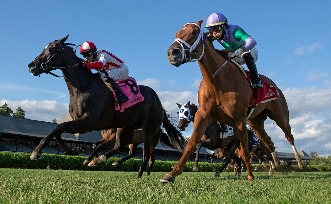 Selflessly (left) wins the 2020 Lake George Stakes at Saratoga Race Course