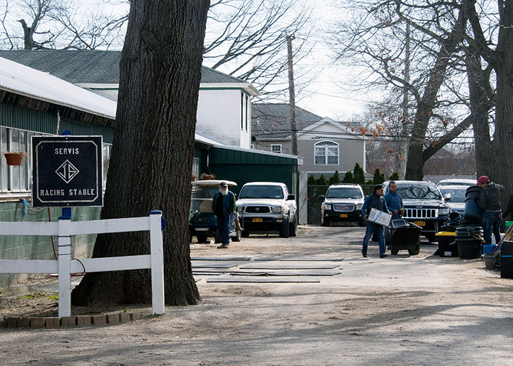 employees clean out the Belmont Park office and barn of Jason Servis on March 11, 2020