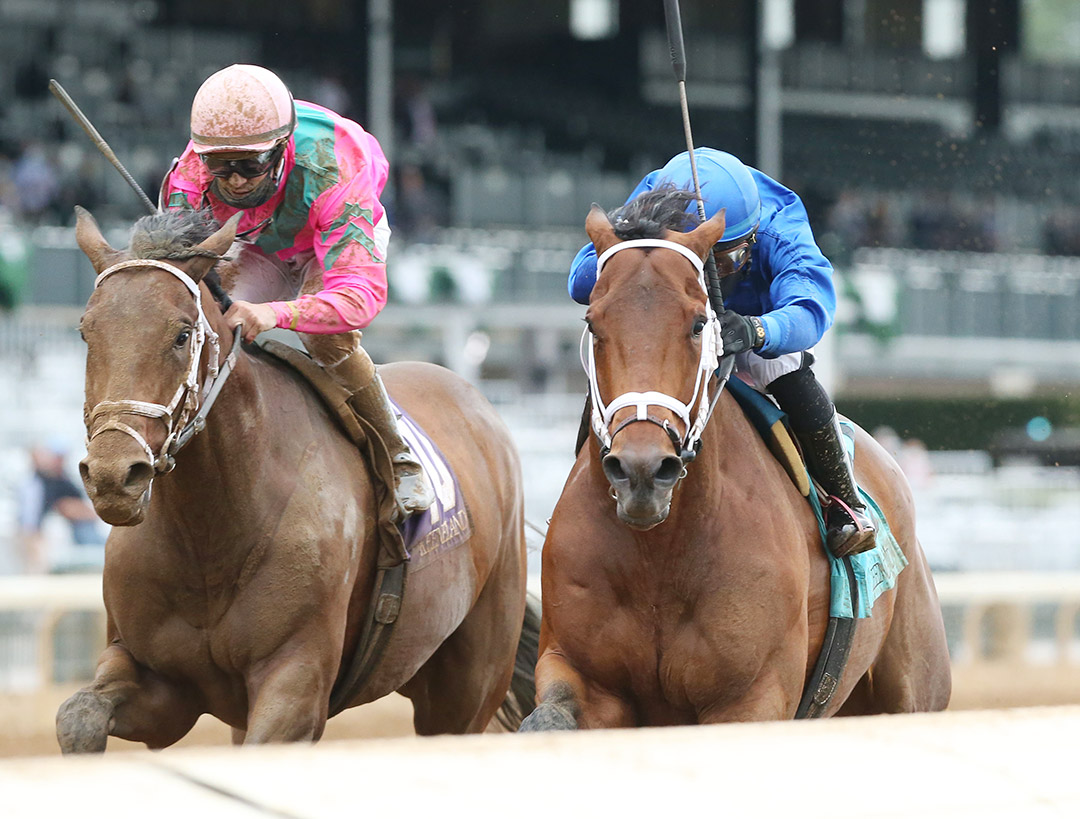 Spa City (right) wins an Oct. 15 allowance race at Keeneland