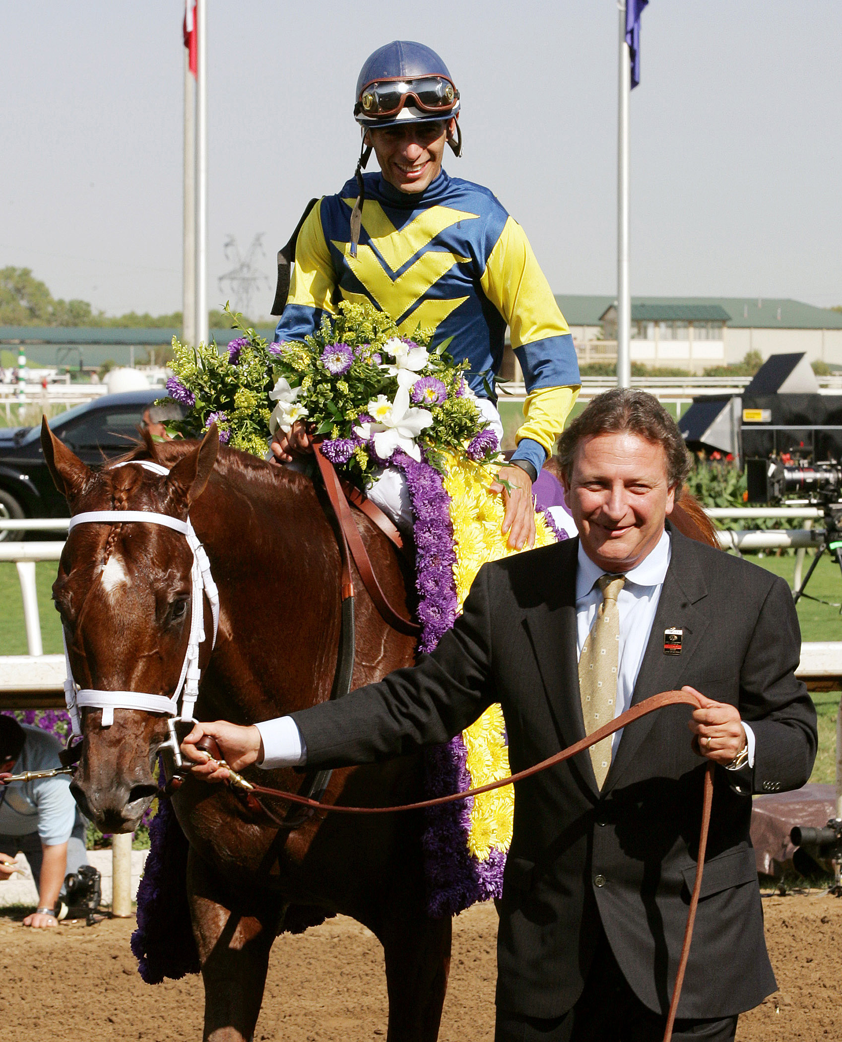 Eugene Melnyk with Speightstown after winning the 2004 Breeders' Cup Sprint
