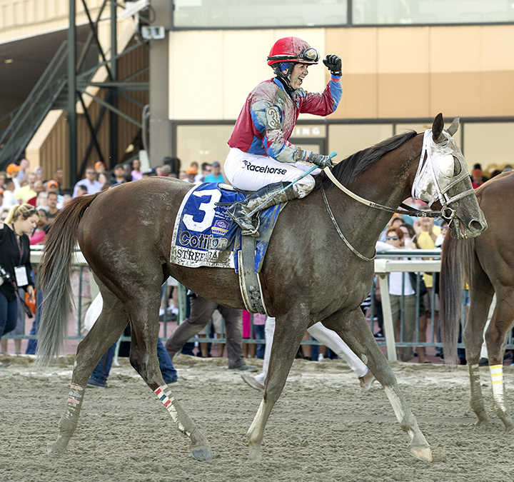 Sophie Doyle celebrates after winning the Cotillion with Street Band at Parx Racing