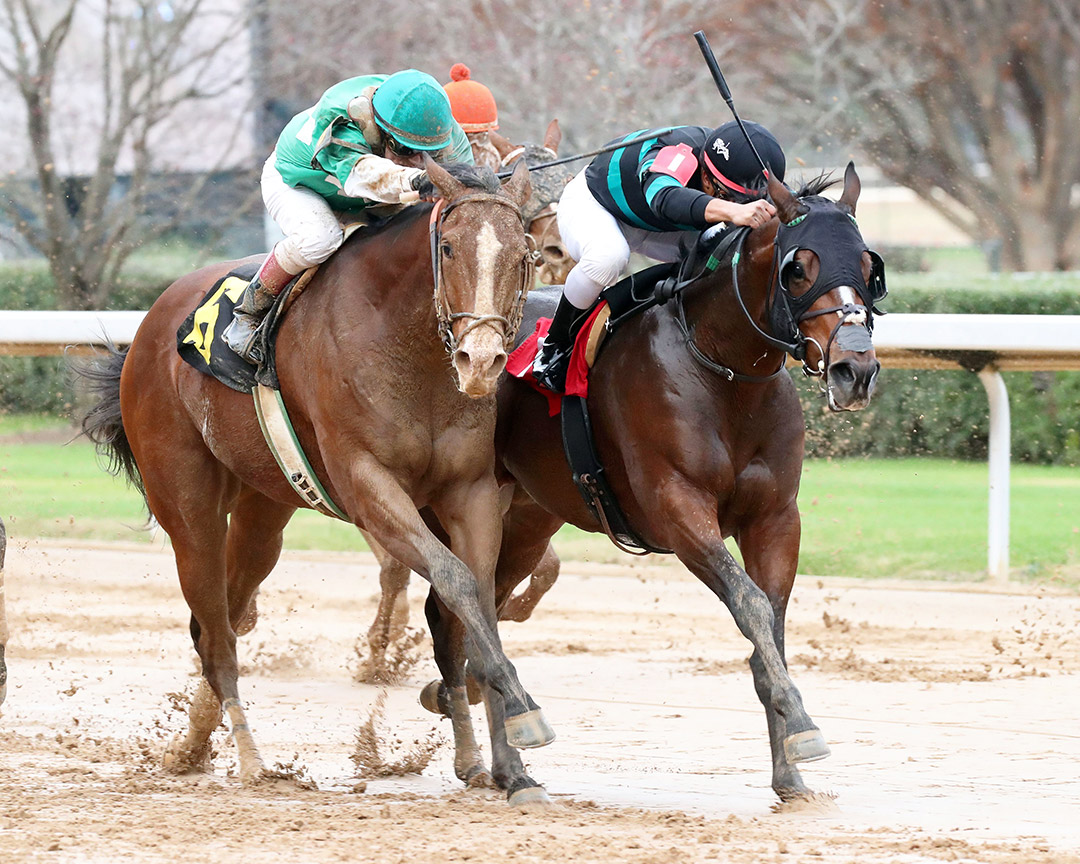 Top Gunner (right) wins a Dec. 5 allowance at Oaklawn Park