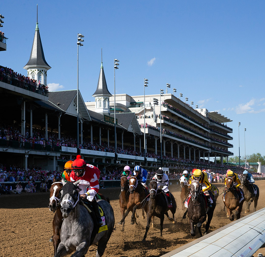 Churchill Downs dirt racing with Twin Spires in the background