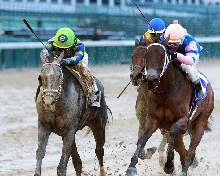Unholy Alliance (left) wins a Nov. 19 allowance at Churchill Downs