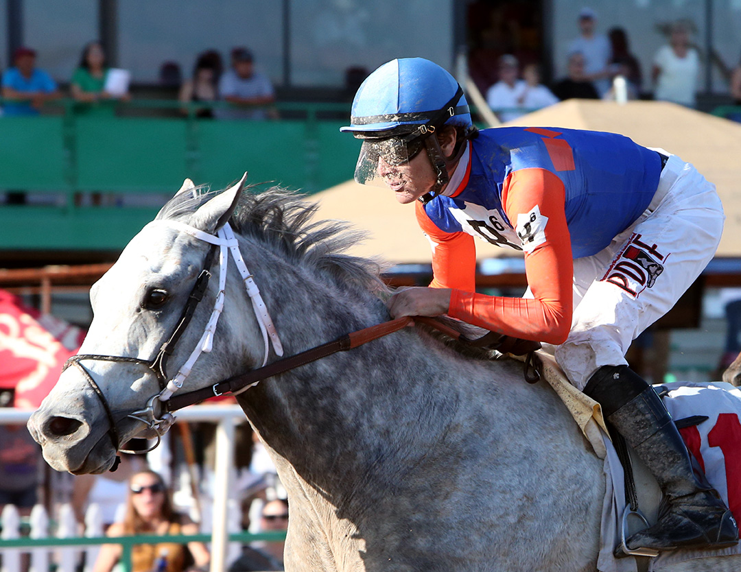 Denny Velazquez guides Silver Ride to victory in the Bienvenidos Stakes at Turf Paradise