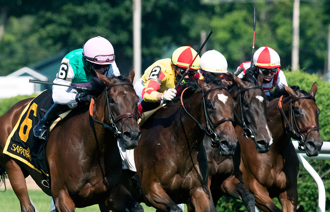 Viadera (No. 6) wins the De La Rose Stakes at Saratoga Race Course