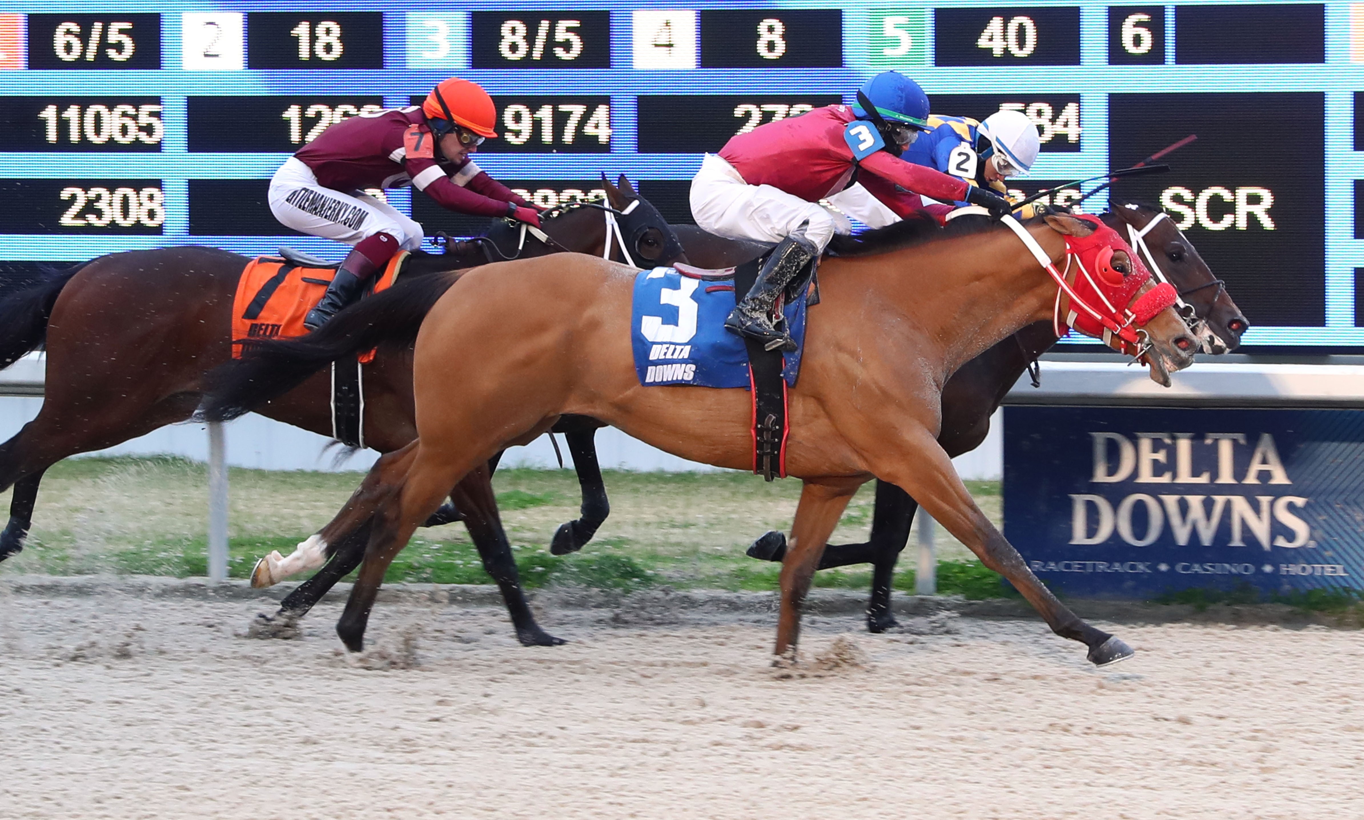 Vodka Gimlet (No. 3) wins the Big Drama Stakes at Delta Downs.02.26.2022