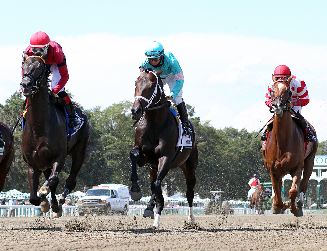Warrior's Charge (center) wins the 2020 Philip H. Iselin Stakes by disqualification