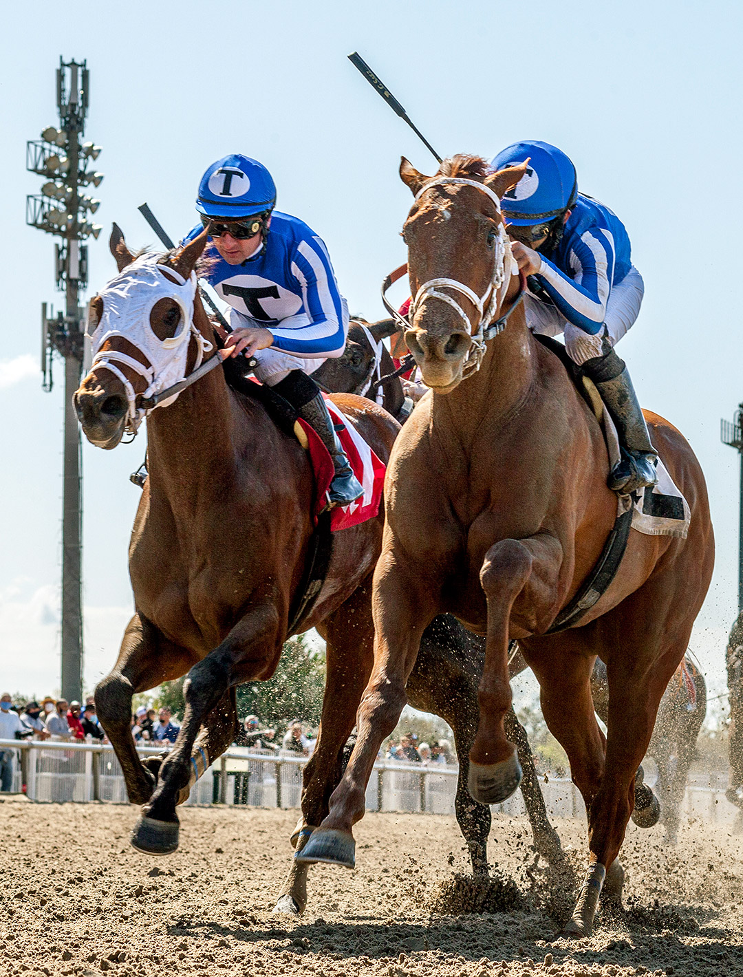 Who Took the Money (right) wins the 2021 Crescent City Derby at Fair Grounds