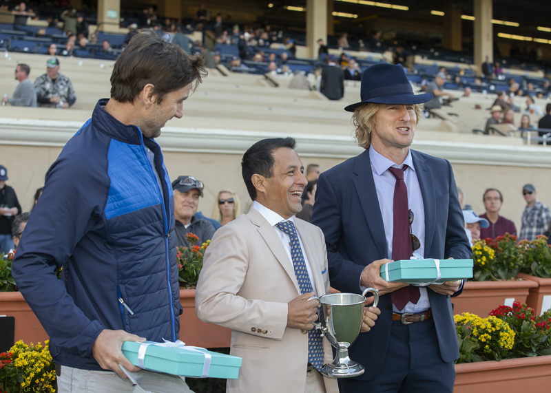 Victor Espinoza with actors Luke (left) and Owen Wilson at Del Mar on 12.1.18