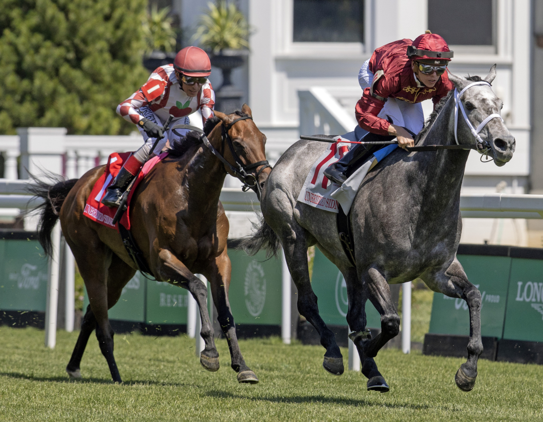 Tayler Gaffalione rides out Caravel to a 1 1/2-length victory over Bay Storm in the Unbridled Sidney Stakes on Friday.