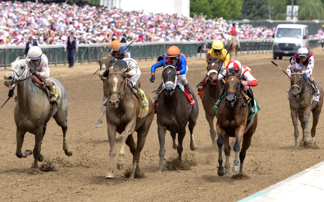 Raging Sea (black cap) beats Taxed (left) in the La Troienne at CD May 2 2025
